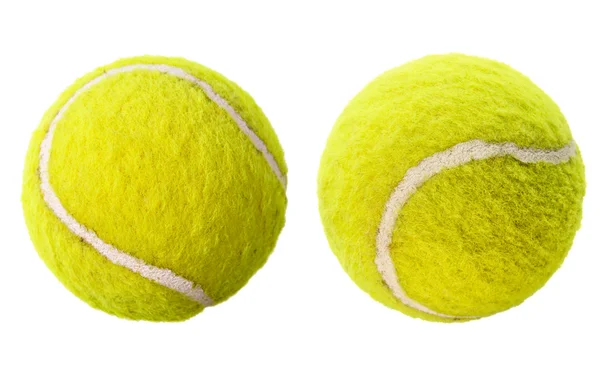 Два изолированных теннисных мяча — стоковое фото
