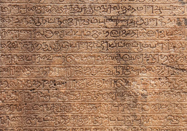 Ancient stone inscriptions texture — Stock Photo, Image