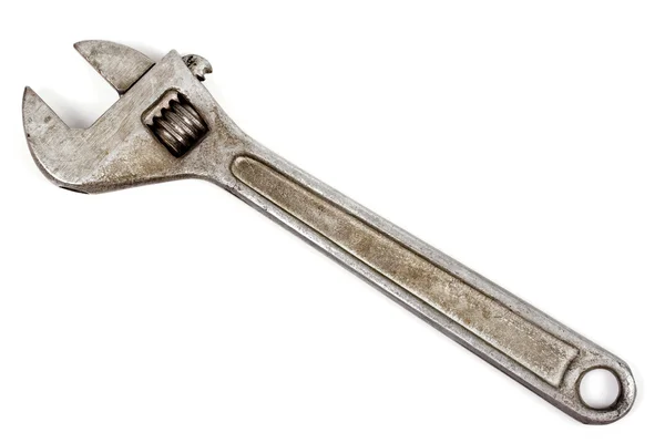 Stary klucz regulowany izolowany — Zdjęcie stockowe