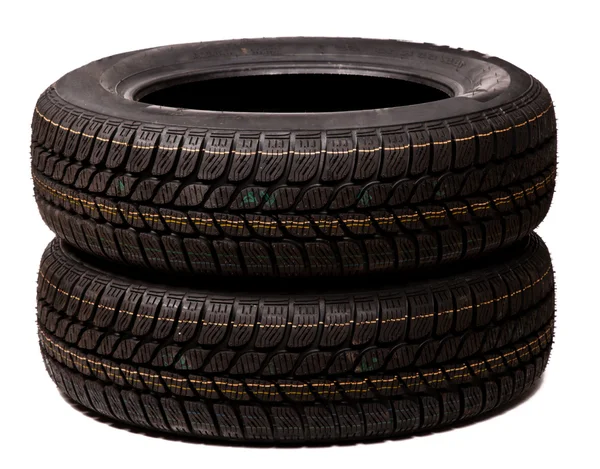 Dvě automobilové pneumatiky izolované — Stock fotografie