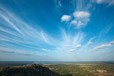 Sky above small mountains clipart