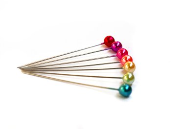 Multi-coloured sewing pins clipart