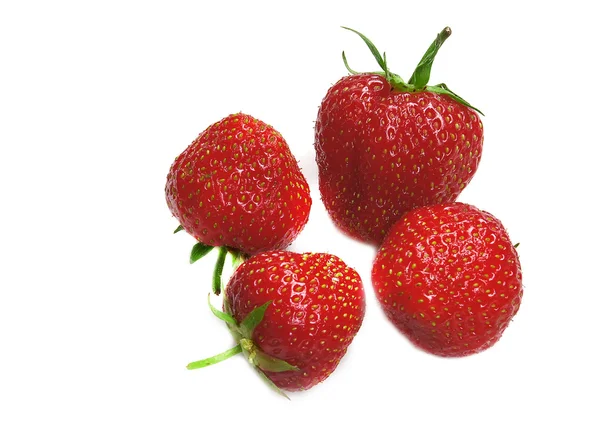 Four strawberry on a white — Stock Photo, Image