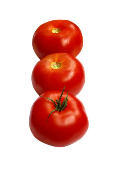 Три помідори — стокове фото