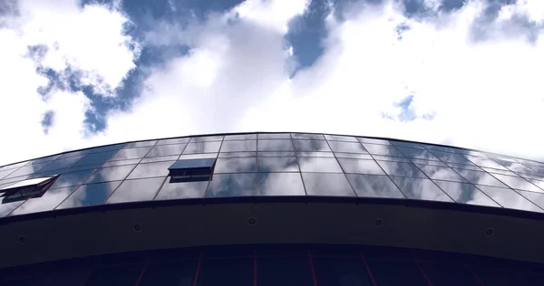 stock image Office building with clouds