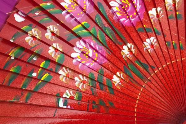 stock image Chinese red wooden fan on the white