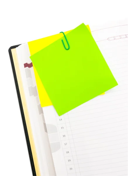 Post-it on the sheet of paper with clip — Stock Photo, Image