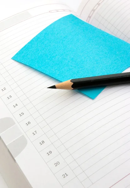 Note book with sticker and pencil — Stock Photo, Image