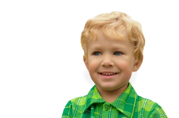 Kleiner blonder Junge auf einem weißen — Stockfoto