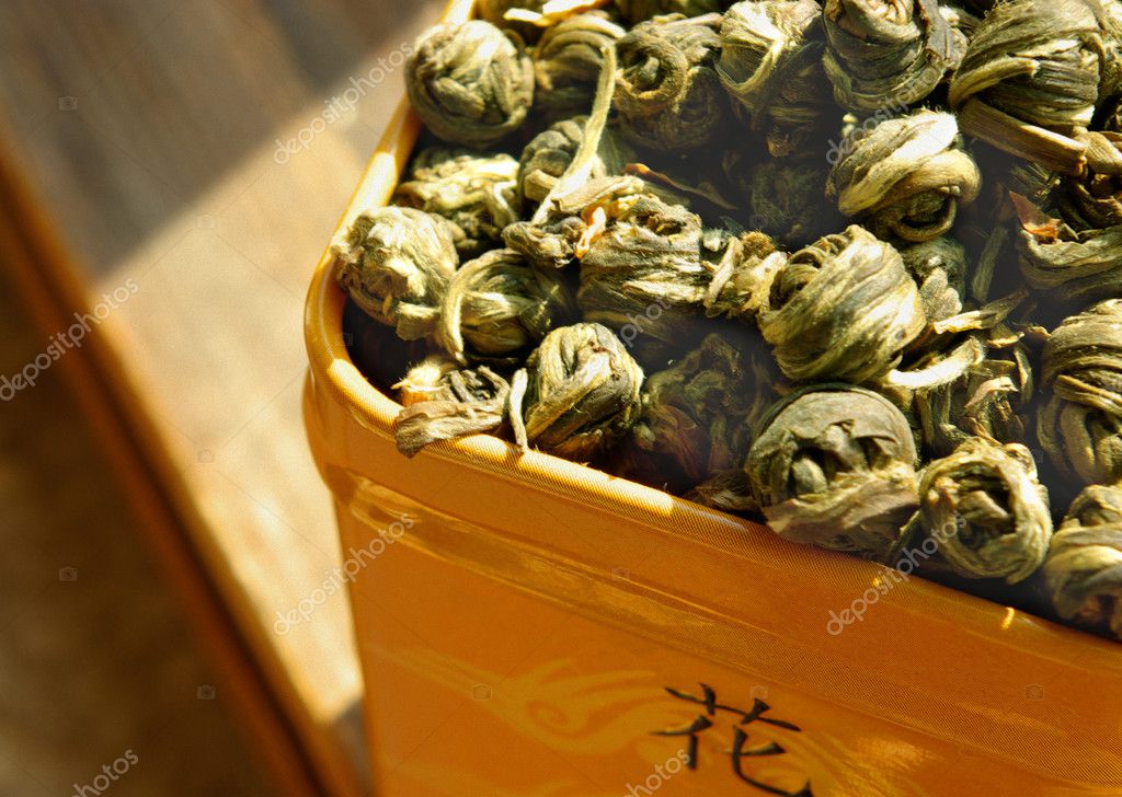 Yellow box with green tea Stock Photo by ©Roxana 1089684