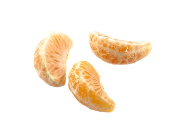Parts of tangerin on the white backgroun — Stockfoto
