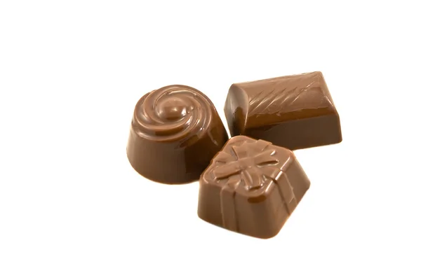 Schokoladenbonbons auf dem weißen — Stockfoto
