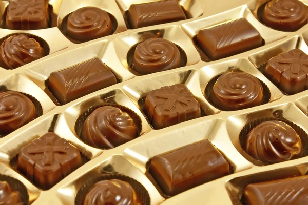 Dulces de chocolate en una caja — Foto de Stock