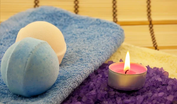 Salt with candle and bath balls — Stock Photo, Image