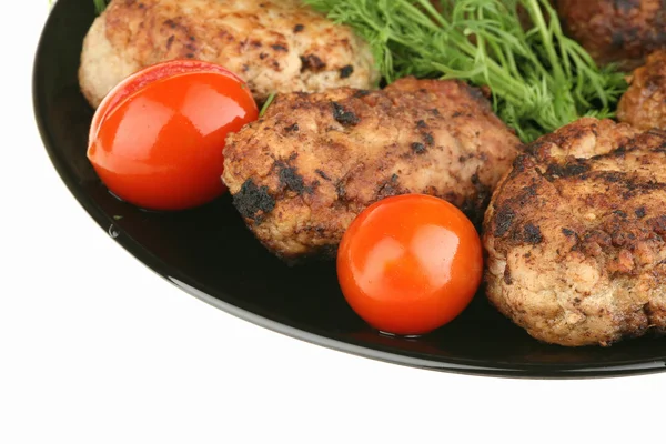 stock image Meat cutlets and red tomatoes