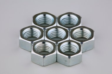 Seven metal nuts clipart