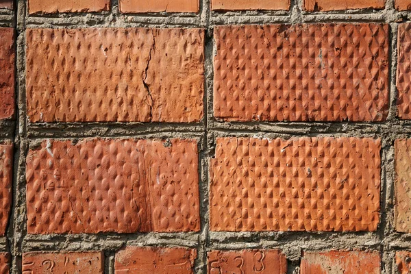 Muro di mattoni rossi — Foto Stock