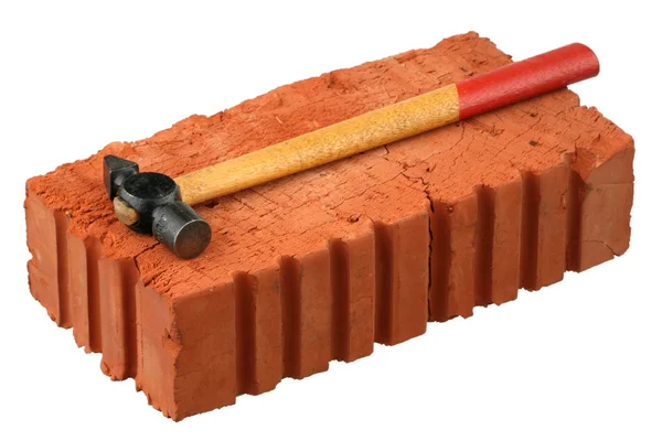 Hammer and red brick — Stock Photo, Image