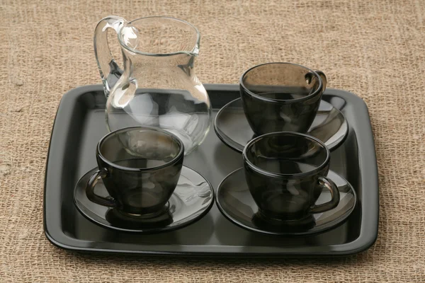 Three coffee pairs and jug — Stock Photo, Image