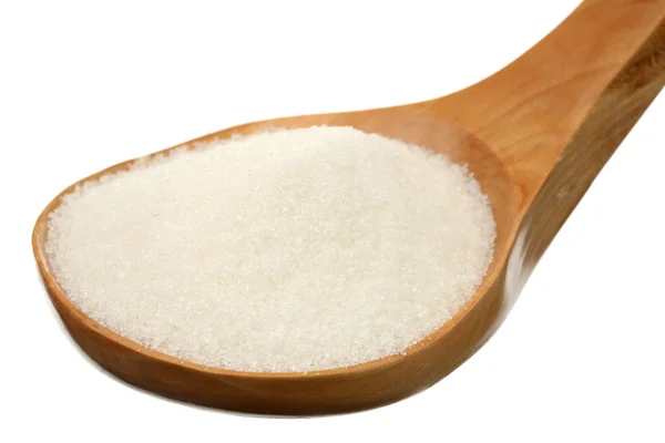 Socker i en träsked — Stockfoto