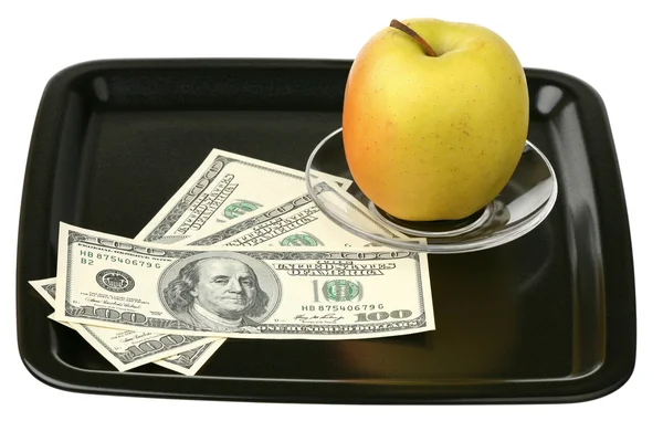 Dollars américains et pomme jaune — Photo