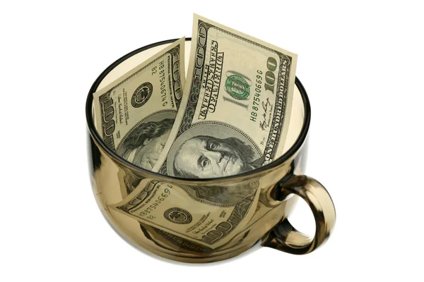 Dollars dans une tasse en verre — Photo