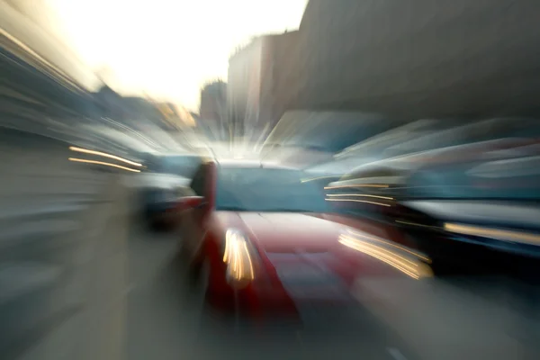 stock image Red car. Blurred Motion.