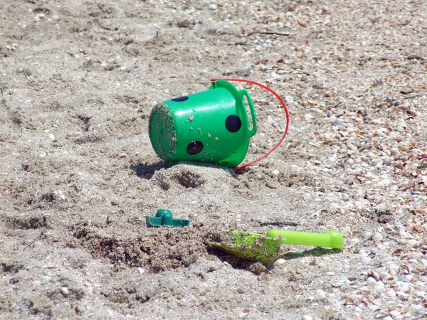 stock image Toy bucket and shovel, abandoned at the