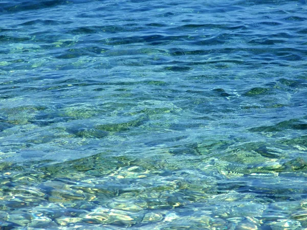 Blaue Oberfläche des Meerwassers — Stockfoto