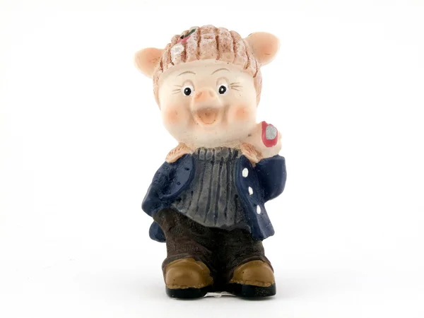 Сувенир - игрушка свиньи на белом бэкгре — стоковое фото