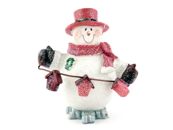 Souvenir - en leksak en snöboll på en vit b — Stockfoto