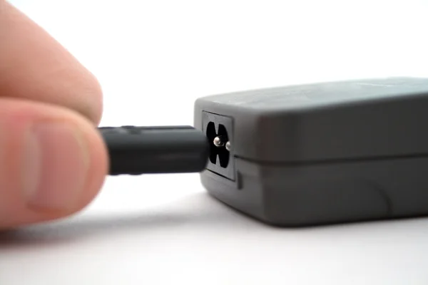 Devic bir güç kablosunun bağlantı — Stok fotoğraf