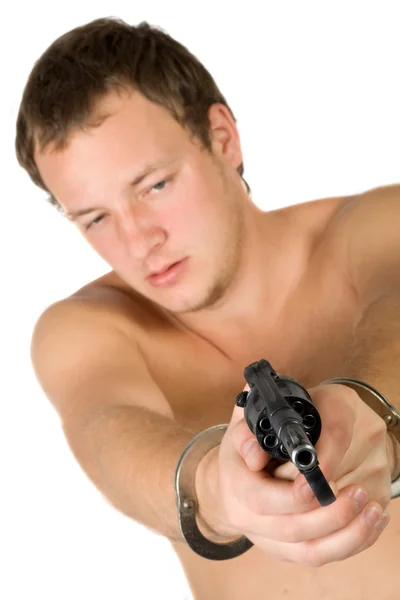 A fiatalember egy pisztolyt. a hangsúly a pi — Stock Fotó