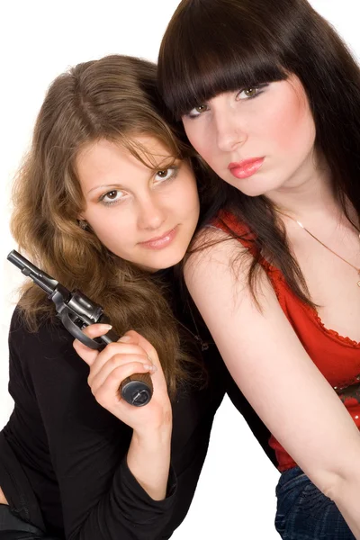 Due giovani donne con una pistola. Isolato — Foto Stock
