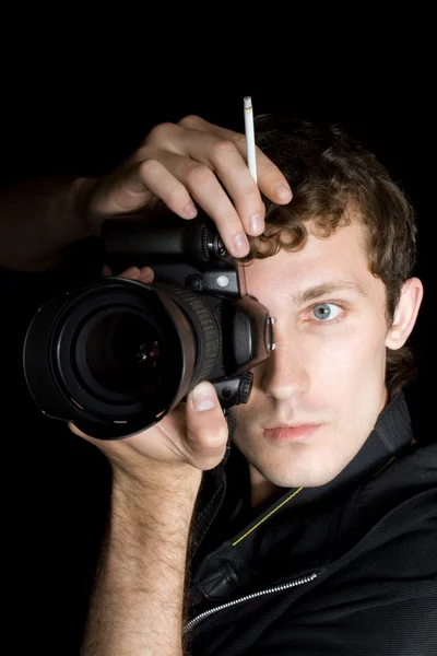 The young man - photographer behind work — Stock Photo, Image