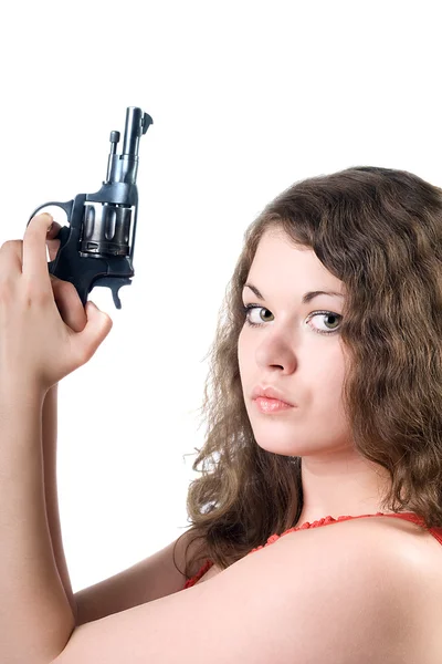 Young woman with a pistol. Isolated on w — Stock Photo, Image