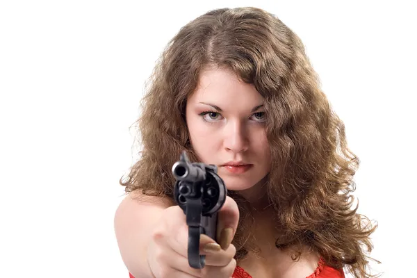 Ung kvinna med en pistol. isolerad på w — Stockfoto