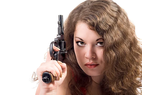 Bir tabanca ile genç bir kadın. w izole — Stok fotoğraf