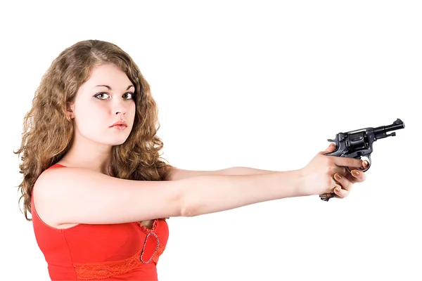 Молода жінка з револьвером. Ізольовано на — стокове фото