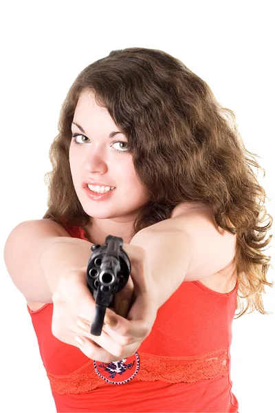 Ung kvinna med en revolver. isolerad på — Stockfoto