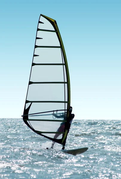 Windsurfer on waves of a sea — Stok fotoğraf