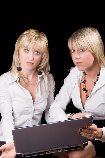 Two businesswomen with laptop. Isolated — Stock Photo, Image