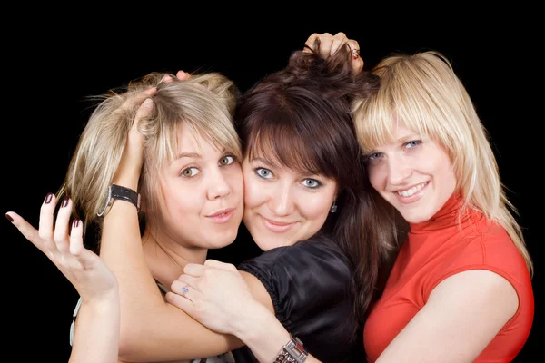 Porträtt av de tre lekfulla unga kvinnor — Stockfoto