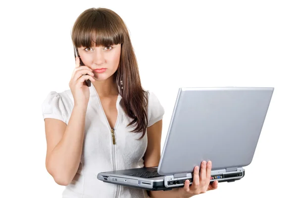 Businesswoman with laptop speaks on the — Stock Photo, Image