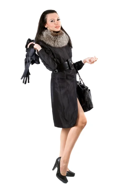 Молода жінка в чорному пальто. ізольовані — стокове фото