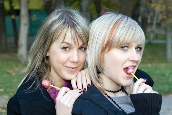 Portrait of the two young women with sug — Stock Photo, Image
