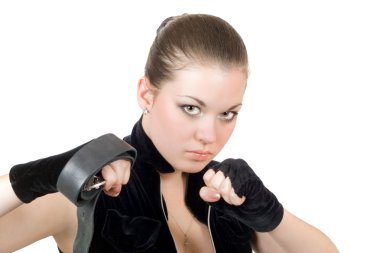 Pretty young angry woman throwing a punc clipart