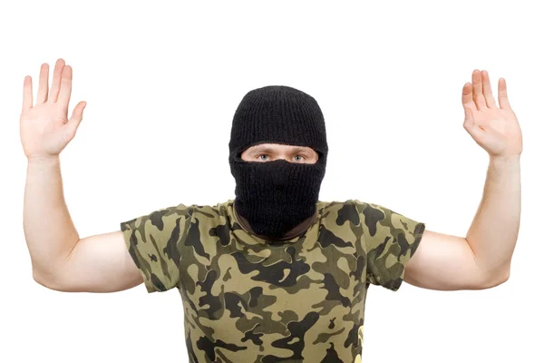 The surrendered criminal in a black mask — Stock Photo, Image