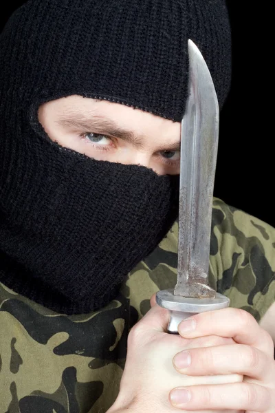 Retrato do criminoso com uma faca — Fotografia de Stock