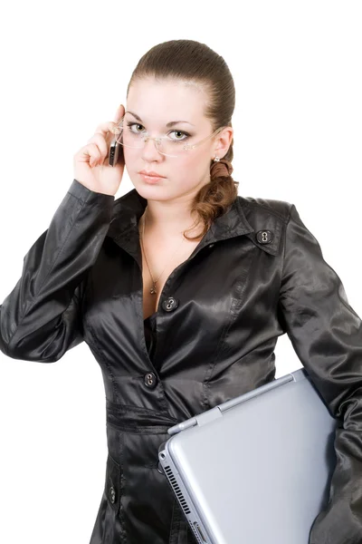 Affärskvinna med laptop och telefon över — Stockfoto